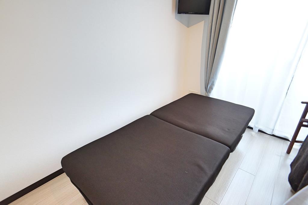 Uro Apartment Osaka Exteriör bild